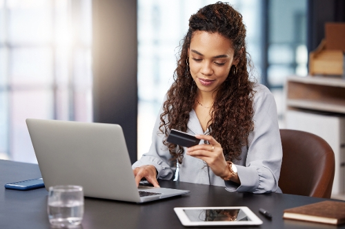 woman paying federal taxes digitally